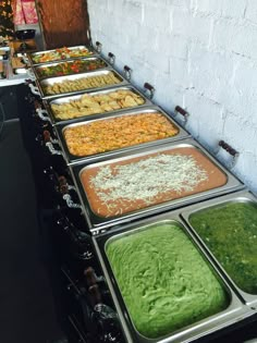 a buffet line with different types of food