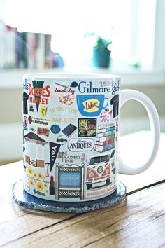 there is a coffee mug that has many different things on it