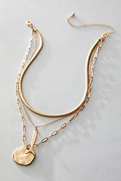 Add a little something extra with this stunning layered necklace featuring a mixture of three different chains accented by naturally-shaped, distressed charm details. * Clasp closure * Fixed length | Oversized Coin Necklace by Free People in Gold Gold Boho Necklace, Thick Chain Necklace, Boho Layering, Boho Grunge, Free People Jewelry, Bold Jewelry, Jewelry Accessories Ideas, Bohemian Necklace, Gold Necklace Layered