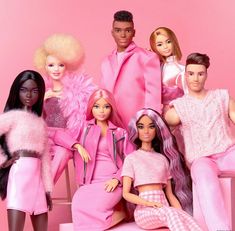 several barbie dolls are posed together in pink outfits