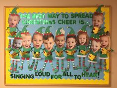 a group of children wearing elf costumes with christmas cheer is singing loud for all to hear