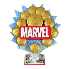 a bunch of gold coins with the word marvel on it in front of a white background