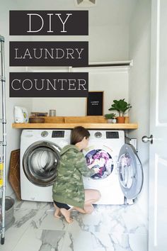 a little boy that is standing in front of a washer and dryer with the words diy laundry counter above it