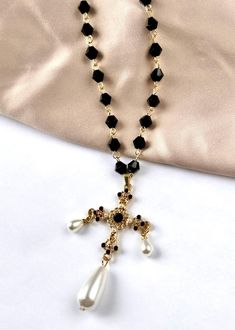 Are you looking for the perfect Tudor cross necklace for someone special this gifting season? Or a unique Renaissance cross necklace to spoil your bestie or significant other? Made with tarnish-free stainless steel findings, regal Renaissance cross charms and repurposed vintage glass beads, my medieval cross necklace is the perfect compliment to any outfit idea! My Goth cross necklace is a great gift idea for any special occasion to all the women in your life. You can't go wrong when gifting my Renaissance jewelry for women to your bestie, wife or girlfriend this autumn! DETAILS - PLEASE READ CAREFULLY: My pearl cross necklace is entirely handmade, using the finest materials, and my best skill set. This stunning set of Tudor-inspired jewelry is: -comfortable to wear -safe for sensitive ski Goth Cross, Medieval Cross, Medieval Necklace, Pearl Cross Necklace, Gothic Cross, Halloween Necklace, Gothic Necklace, Ringe Gold, Repurposed Vintage