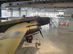 an airplane is on display in a museum