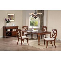 a dining room table with chairs and a chandelier hanging from the ceiling in front of a window