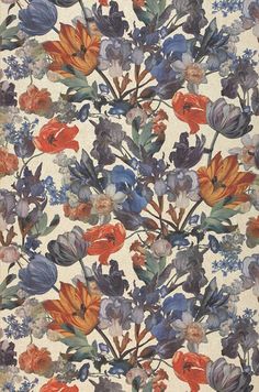 a floral wallpaper with many different colors and sizes on the walls, including blue, orange