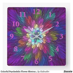 a colorful clock with numbers on the front and side of it that has an image of a flower in the middle