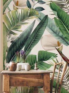 a tropical wallpaper with birds, flowers and leaves on the background is an old wooden table