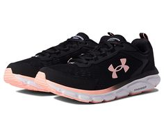 Under Armour Charged Assert 9 - Women's Shoes : Black/White/Pink Sands : Hit the streets and train hard with these Under Armour Assert 9 running shoes, featuring Under Armour branding and a lace-up closure. Offering a stealthy design and superior cushioning, you're sure to love the Under Armour Charged Assert 9. Traditional lace-up closure for a secure fit. Lace-up closure. Lightweight mesh upper delivers complete breathability. Lightweight mesh upper with 3-color digital print delivers complete