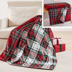 a plaid blanket sitting on top of a white couch next to a red present box