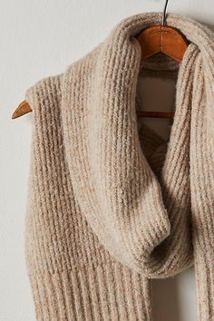 Sure to be a staple in your cold-weather accessories collection for countless years to come, this totally timeless scarf is featured in a soft, ribbed-knit fabrication with defined fringe at hems for the perfect finishing touch. | Hit The Ground Scarf by Free People in Tan Scarf Knitting Pattern, Tan Scarf, Purple Scarves, Winter Scarves, Scarf Knitting, Cozy Scarf, Scarf Knitting Patterns, Cold Weather Accessories, Blanket Scarf