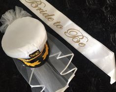 a cake on top of a table next to a ribbon