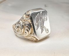 Massive 1930s antique silver German signet ring, with initials 'HK' or 'KH' engraved, marked '800' for silver, the ring is in good condition. Box on the photos not included! Material: 000 silver Weight: 27.8 g US size: 10 (EU 62) Luxury Antique Silver Signet Ring, Ring With Initials, Signet Rings, Silver Signet Ring, Us Size 10, German Silver, Slovenia, Signet Ring, Antique Silver