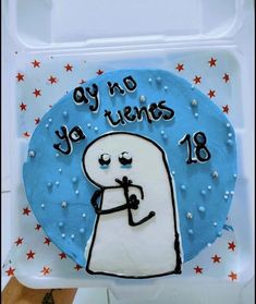 there is a cake that has been decorated to look like a ghost