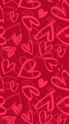 red and pink hearts on a red background