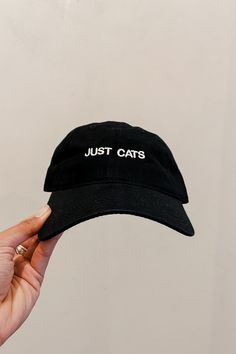 Just Cats embroidered black hat with white writing. Embroidered in Los Angeles, CA. PIPE AND ROW Caps Game, Cat Hat, Black Hat, Work Outfit, The Row, Baseball Hats, Casual Outfits, Angeles, Writing