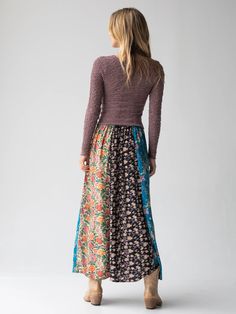 We are obsessed with MIXED PRINTS! This gorgeous Valentina Maxi Skirt in Turquoise Mixed Print is the perfect piece to express your boho spirit and express your unique self! The vertical striped panels of beautiful floral prints make this skirt so fun to wear - it looks so effortlessly cool when paired with any of our tops, and don't be afraid to mix and match for a super unique and fashionable outfit! The flat front elastic waistband and A-line shape create the most flattering, flowy fit that w Blue Patchwork Skirt For Fall, Bohemian Blue Bottoms With Floral Patchwork, Mixed Prints, Yellow Cream, Feminine Beauty, Brown Floral, Bohemian Clothes, Vertical Stripes, Mixing Prints