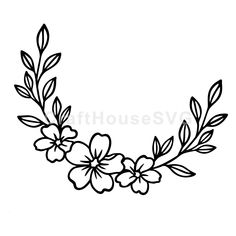 a flower wreath with leaves and flowers on it