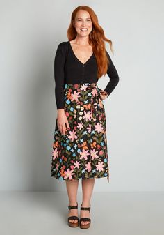 Inspired by vintage spring florals, this black wrap skirt from Aussie brand Princess HIghway features an abundant burst of blooms in shades of pink and blue surrounded by lush greenery, blossoming strawberries, and a variety of cute creatures buzzing throughout. Made from a soft linen-cotton weave, this retro-chic midi skirt boasts a high-rise waistline with adjustable tie-belt closure at the hip, and a stylish A-line silhouette. Strawberry Bouquet, Black Wrap Skirt, Squirrel Girl, Wild Strawberry, Princess Highway, Spring Florals, Bouquet Wrap, Wild Strawberries, Black Wrap