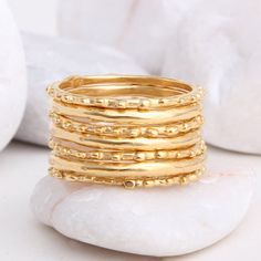 Design your own ring using our handmade gold bands. Stack as many as you wish to create a unique accessory. Rings Multiple, Rings Stack, Stackable Birthstone Rings, Rings Dainty, Birthstone Stacking Rings, Stack Rings, Dainty Rings, Stackable Ring Sets, Design Your Own Ring