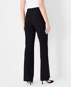 Elevate your wardrobe with the Ann Taylor Petite High Rise Trouser Pant, designed to offer both comfort and a polished look throughout the year. These trousers are a testament to timeless style and functionality, tailored to flatter and elongate your silhouette.

- **Size:** Petite 10
- **Material:** 68% Polyester, 29% Viscose, 3% Spandex
- **Color:** Neutral palette
- **Gender:** Female
- **Fit:** Tailored and fitted with a high rise that sits just below the natural waist
- **Leg Shape:** Trous Knitted Suit, High Waisted Trousers, Trouser Pants, Polished Look, The High, Timeless Style, Evening Wear, Outerwear Jackets, Effortless Style