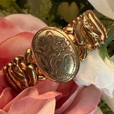 This Vintage Pitman & Keeler American Queen Sweetheart Expansion Bracelet Is A Stunning And Unique Piece Of Jewelry. These Bracelets Are Highly Historical And Collectible. Many Of These Bracelets Are Monogrammed, But This One Doesn't Have One. You Can Add Your Own Initials If You Like. It's A Small Size That Will Fit A Wrist, Size 4 Inches, But Stretches To 8 1/4 Inches On A Measurement Cone. You Can See That It Fits Me, An Adult With A Small Wrist, In The Above Photo. The Bracelet Is Made Of Yellow Gold-Filled Material And Is Signed On The Back -- American Queen, Pitman & Keller. The Bracelet Is Pre-Owned And Has A Vintage Charm To It That Takes You Back To A Different Time. It Has N Elegant Wedding Bracelets With Vintage Charm, Elegant Gold Bracelets For Vintage Events, Vintage Jewelry With Historical Design, Elegant Vintage Charm Bracelets For Anniversary, Elegant Vintage Charm Bracelet For Anniversary, Elegant Antique Gold Bracelets For Wedding, Elegant Antique Gold Wedding Bracelets, Heirloom Style Formal Bracelets With Vintage Charm, Heirloom Bracelets With Vintage Charm For Formal Occasions