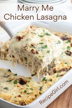 a casserole dish filled with chicken lasagna and topped with melted cheese