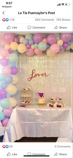 an image of a table with balloons and cake on it that says love surrounded by confetti