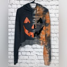 Halloween Women’s Medium Cropped Hoodie Tie Dye Orang/Grey- Nwt Orange Hoodie Sweatshirt For Fall, Orange Hooded Sweatshirt For Fall, Spooky Hooded Sweatshirt For Fall, Spooky Fall Streetwear Hoodie, Orange Drawstring Hood Top For Fall, Spooky Hoodie Sweatshirt For Fall, Halloween Tie Dye, Halter Neck Crop Top, Puma Shirts