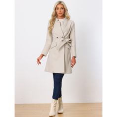 This stylish trench coat features a modern stand collar that adds a touch of sophistication, along with an open front design for effortless wear. It has convenient pockets that blend functionality with style, making it perfect for everyday use. The coat is belted, which not only enhances its visual appeal but also ensures a flattering fit for a variety of body types. This thoughtful design element emphasizes your waist, creating a slimmer, more elegant silhouette that is both fashionable and tim Elegant Fitted Belted Outerwear, Fitted Outerwear With Self Belt For Work, Fitted Office Outerwear With Self Belt, Fitted Long Sleeve Outerwear With Self Belt, Winter Overcoat, Long Overcoat, Winter Outwear, Outwear Coat, Long Winter Coats