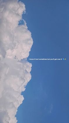 an airplane is flying high in the sky with clouds behind it and words written below