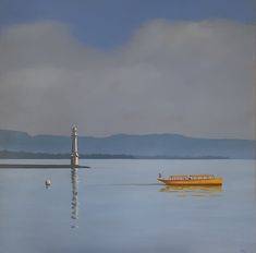 a yellow boat floating on top of a lake next to a light pole in the distance