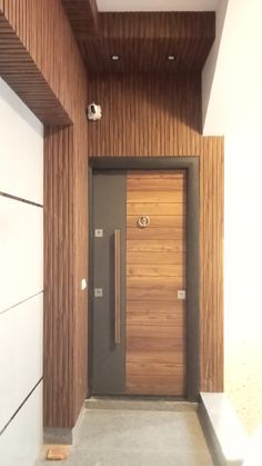 the door is made of wood and metal