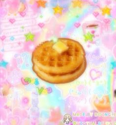 a waffle with butter on it sitting on top of a pink table cloth covered in stars