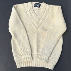 100% Wool Hand Knit Approximate Sizes: 21” Across Chest 27” Back Of Neck To Bottom 25” Shoulder To End Of Sleeve 15”-16” Across The Bottom Classic White V-neck Sweater For Winter, White Ralph Lauren Sweater For Fall, Ralph Lauren White Sweater For Fall, Classic Fitted Knit Sweater, Classic Cream V-neck Sweater For Winter, White Wool V-neck Sweater, Ralph Lauren Classic Cable Knit Sweater, Ralph Lauren Cream Sweater, Ralph Lauren Long Sleeve Winter Sweater