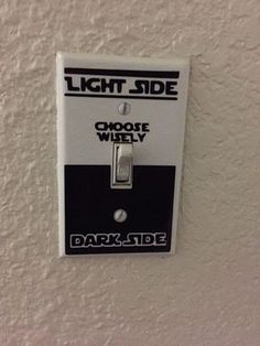 a light switch with the words dark side on it