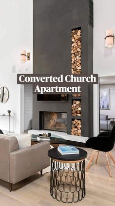 a modern living room with wood stacked on the wall and fireplace in the center area