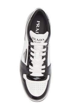 Patent leather gives a fresh-for-the-season shine to this monochromatic low-top sneaker featuring a perforated toe and three versions of the iconic Prada logo. Lace-up style Removable insole Leather upper/leather and textile lining/rubber sole Made in Italy Men's Designer Shoes Prada Logo, Mens Designer Shoes, Sneaker Men, Up Styles, Low Top, Designer Shoes, Patent Leather, Top Sneakers, Rubber Sole