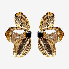 Bead Type: CrystalIncluded: 1 Pair of EarringsEarring Back: PostShape: FlowerMetal Color: Gold ToneEarring Length: 2 1/2 InchEarring Width: 1 1/2 InchCare: Wipe CleanStone Type: 2 CrystalEarrings Type: Post EarringsEarrings Style: Drop EarringsMetal: ZincCountry of Origin: Imported Chic Gold Flower Earrings For Party, Metal Flower Earrings For Evening, Chic Metal Flower Earrings For Party, Metal Drop Flower Earrings For Evening, Glamorous Gold Flower Earrings For Evening, Chic Evening Flower Earrings, Glamorous Evening Flower Earrings For Pierced Ears, Elegant Black Flower Earrings For Party, Elegant Black Flower Earrings For Evening