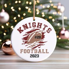 a christmas ornament with a football on it