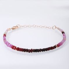 Queenly Ruby Faceted Rondelle Beaded Bracelet with adjustable silver clasp to add grace & elegance to your Hands.....Stone Color: Ombre RedStone Dimension : 3 MM to 4 MMStone shape : Faceted RondelleBracelet Length: 22 CmsCarat Weight : 29 (Approx.)NOTE: The length of the bracelet is 7-8 1/2" inches or 18-21cm from clasp to closure.Happy Shopping Pink Ruby Round Bracelets, Adjustable Red Birthstone Bracelet, Multicolor Ruby Jewelry As Gift, Multicolor Ruby Jewelry For Gift, Multicolor Ruby Jewelry Gift, Ruby Gemstone Round Beads Jewelry, Ruby Gemstone Jewelry With Round Beads, Pink Ruby Bracelets As Gift, Faceted Ruby Rondelle Jewelry