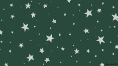 white stars on a dark green background