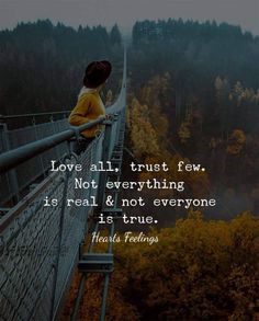 a person sitting on top of a bridge with trees in the background and a quote about love all, trust few not everything is real & not everyone is true