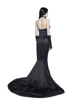 This strapless maxi dress has a satin construction with a wired underbust, a front ribbon lace-up design with self-tie hem closures, a short train, and a back hook and zipper closure. Black Satin Dresses With Boning, Black Strapless Dress With Corset Back For Gala, Black Satin Gown With Sweetheart Neckline, Black Strapless Gown With Corset Back, Black Satin Maxi Dress With Fitted Bodice, Black Strapless Dresses With Lace-up Back, Strapless Dress With Corset Back For Costume Party, Black Fitted Gown With Corset Back, Black Satin Corset Dress With Boning