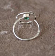 Natural Emerald Ring, May Birthstone, Unique Ring, Solid Silver Ring, Engagement Ring, Designer Emerald Ring, Wedding Ring, Green Stone ring 100 Percent Super Fine Natural green Emerald set in a modern style mounting made from of a sterling silver. Perfect alternative engagement ring, promise ring. People having issues retaining wealth can benefit by emerald stone, as it is said to have the power to hold money with the wearer. Children who cannot concentrate on their work and studies can benefit Gift Emerald Ring With Tension Setting, Emerald Ring With Tension Setting As Gift, Handmade Adjustable Emerald Ring For Anniversary, Adjustable Oval Emerald Ring For Gift, Adjustable Open Emerald Ring Birthstone, Adjustable Open Emerald Ring As Birthstone, Adjustable Open Emerald Ring With Birthstone, Adjustable Open Emerald Birthstone Ring, Adjustable Emerald Ring For Gift, May Birthstone