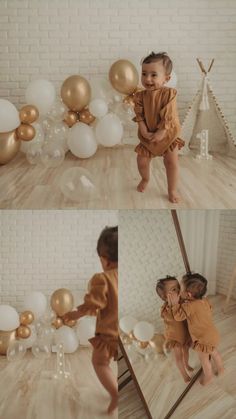 two toddlers playing with balloons in front of a mirror