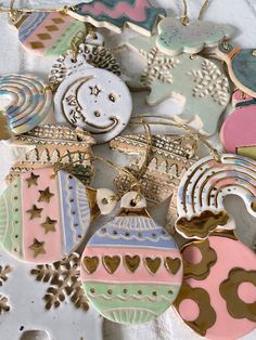 some very pretty decorated cookies on a table