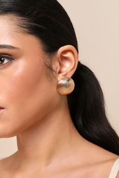 From casual after work cocktails to iconic VIP events, the Lulus Mesmerizing Radiance Gold Textured Circle Statement Earrings are here to help you impress! Shiny, gold-toned metal shapes these stunning earrings that have an oversized, round profile and a textured design of raised lines across the surface. Omega clips and post backs. Hoop Earring is 1. 25" Diameter. 100% Iron. Imported. Lulus | Mesmerizing Radiance Gold Textured Circle Statement Earrings. Round Profile, Jewellery Photography, Lulu Fashion, Gold Earrings Designs, Textured Design, Jewelry Photography, Accessories Jewelry Earrings, Stunning Earrings, Gold Texture