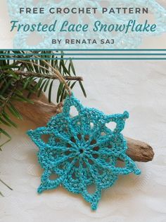 a crocheted snowflake is sitting next to a pine tree branch with the text, free crochet pattern frosted lace snowflake by renata sa